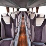 AU20-130-6 printed PVC flooring texture for bus and coach interiors, a warm reddish-brown mixed-width wood-plank pattern