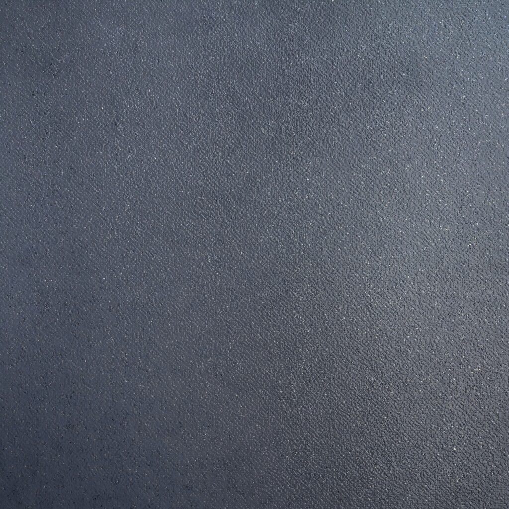 AU20-8603L lightweight PVC flooring texture for bus and coach interiors, a deep charcoal fine-textured surface with subtle light specks