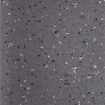 AU20-2430 anti-slip PVC flooring texture for bus and coach interiors, a medium-gray base with green, dark and beige chips