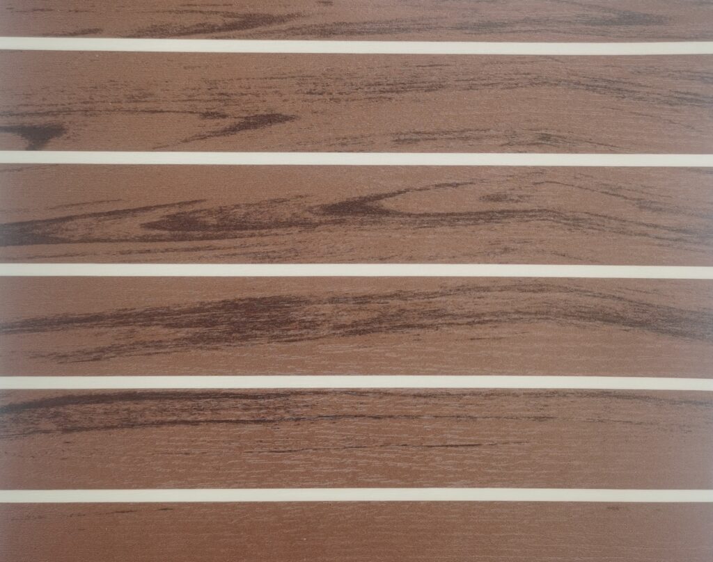 AU20-3652 printed PVC flooring texture for bus and coach interiors, a warm brown wood-grain plank pattern with pale dividing strips